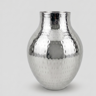 hand-hammered metal vase